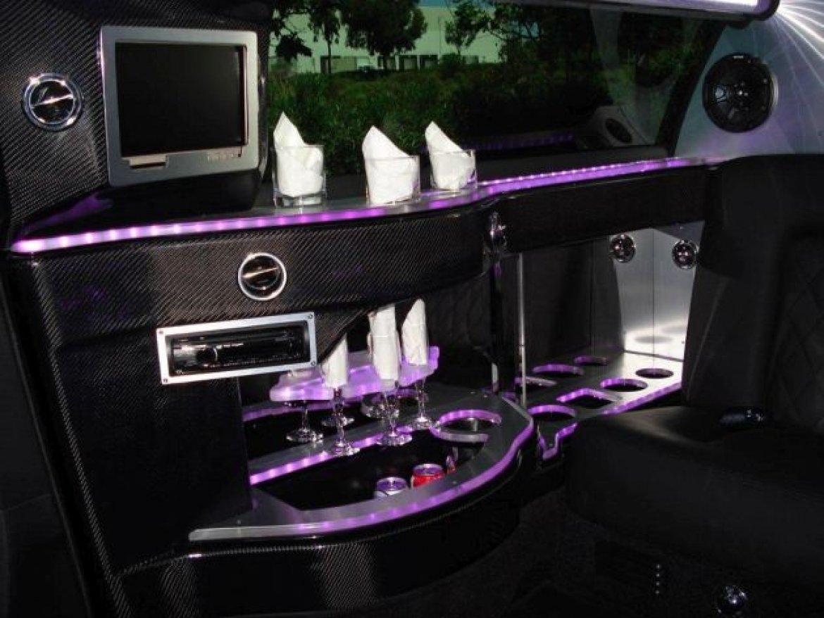 Photo of Limousine for sale: 2013 Chrysler 300 Black-Tux 6-Pass Limousine