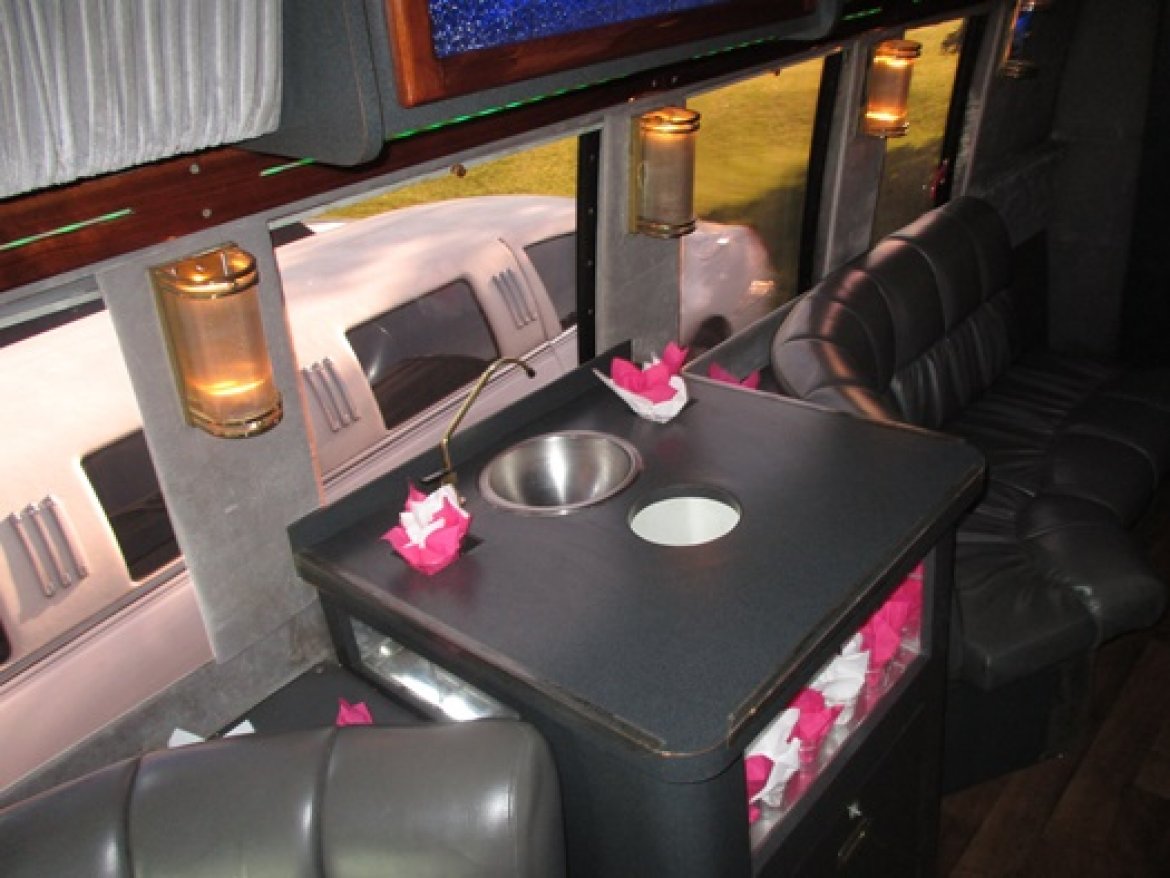 Photo of Limo Bus for sale: 2000 Ford E450 by Turtle Top