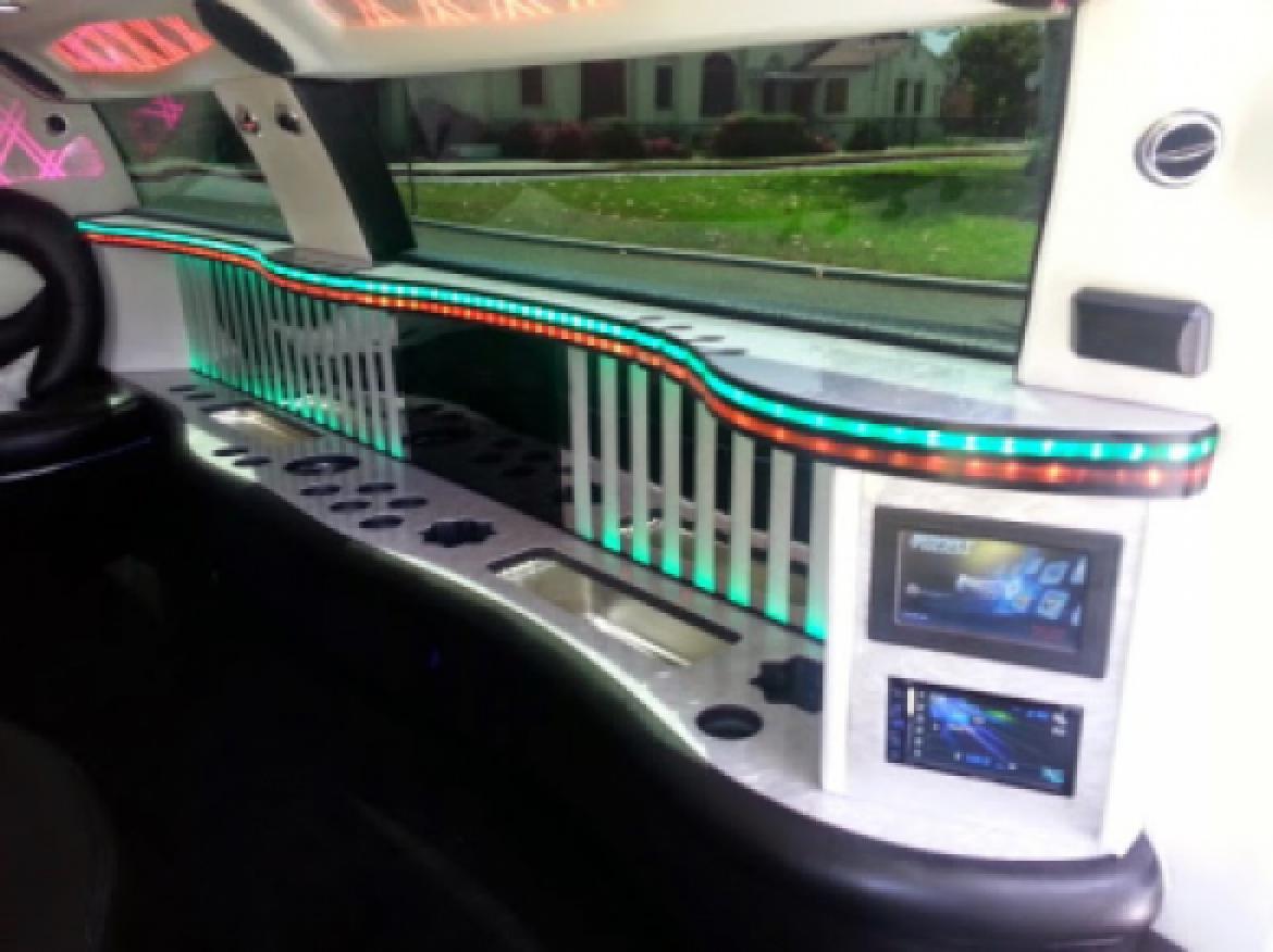 Photo of Limousine for sale: 2015 Jeep Grand Cherokee by American Limousine Sales