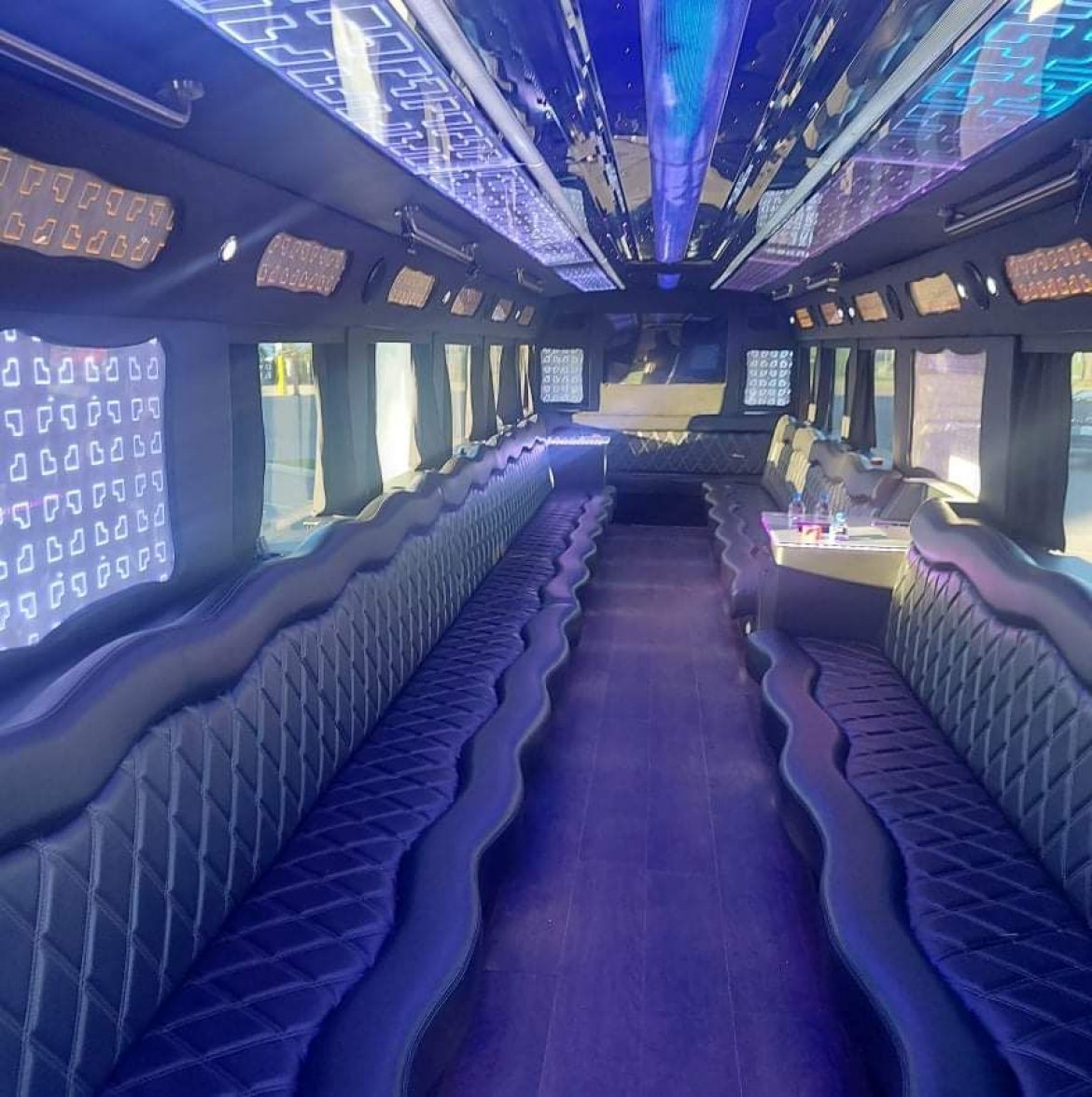 Limo Bus for sale: 2005 MCI D45 by First Class Coachworks INC