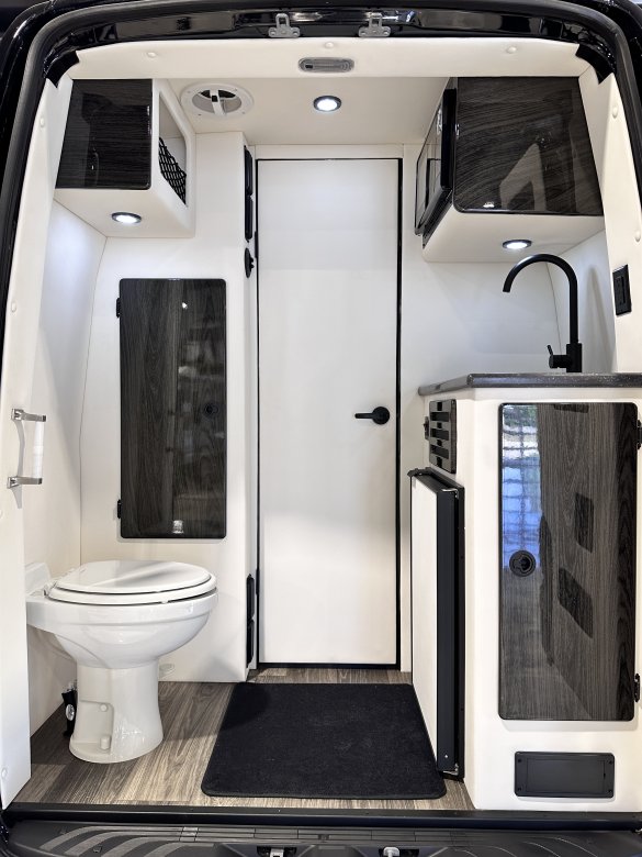 2025 OGV LUXURY Mercedes-Benz 10 Passenger Arched Partition - Rear Bathroom Sprinter