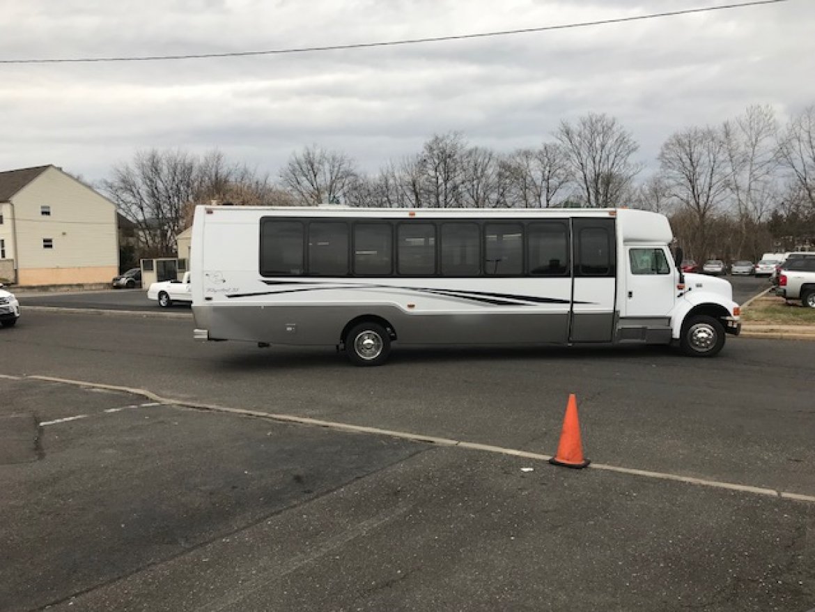 Photo of Limo Bus for sale: 2002 International 3200 by Krystal Koach